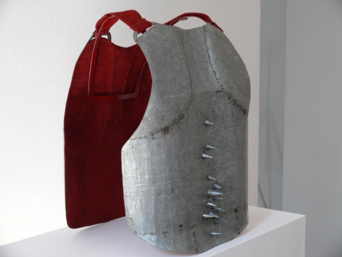 Naiza H Khan, Bullet-proof west, 2009, ferro zincato, cuoio, 48x35x30 cm, ed. 2