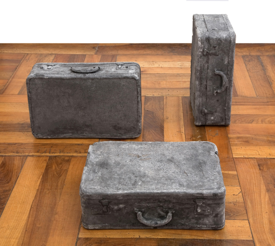 John Jurayj, Untitled (family luggage), 2010, plaster and gunpowder, exhibition view