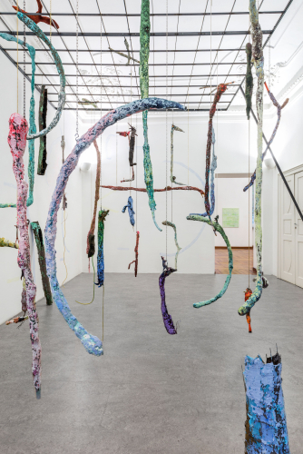 Francesca Ferreri, Quiet, mossy yet alive, 2022, jesmonite, silica sand, marble dust, pigments, plaster, objects, consolidating resin, iron, 330x350x360 cm