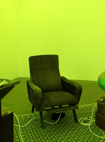 Roberto Casti, From the depths of the Earth (armchair), 2026, armchair, cables, speakers, LED light, sound, 90 × 90 × 70 cm